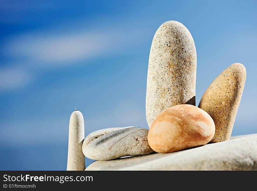 The sea pebble is shined by morning light on a beach. The sea pebble is shined by morning light on a beach