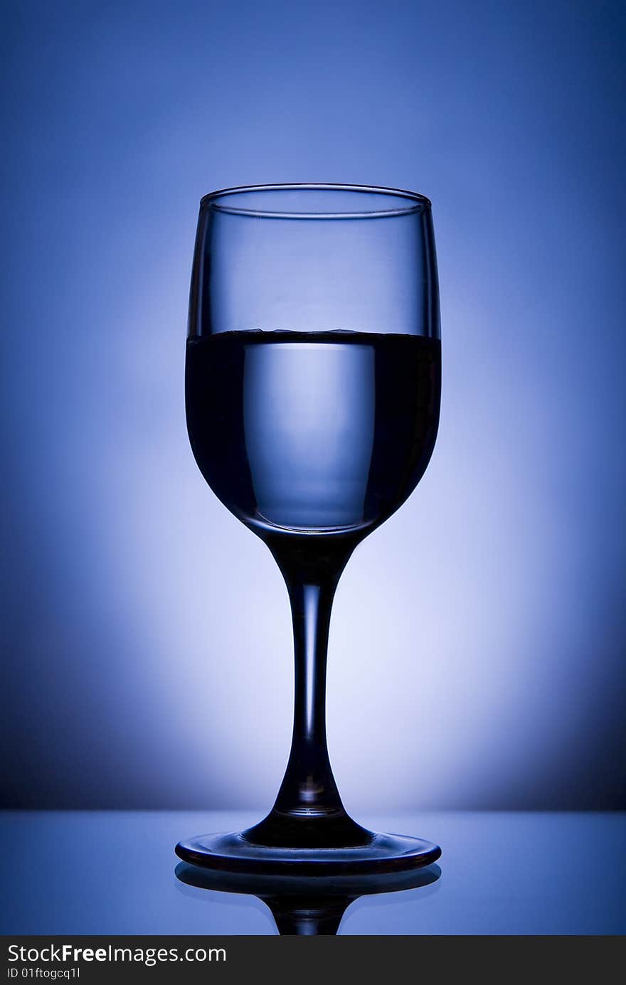 Image of glass on blue background. Image of glass on blue background