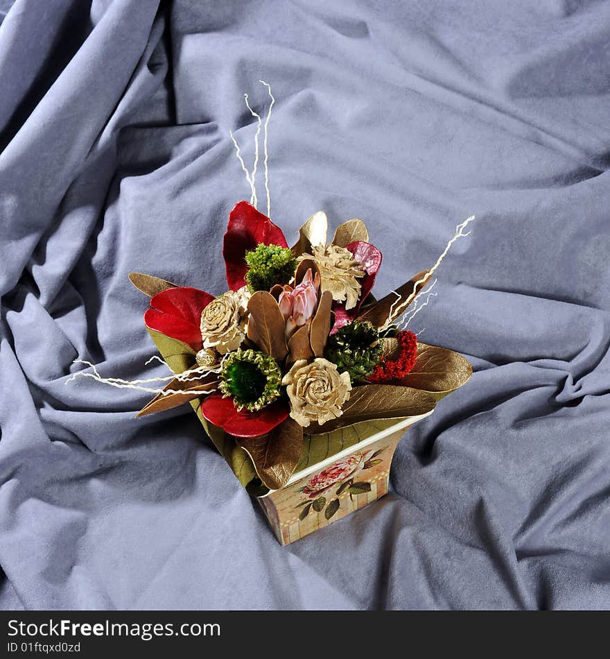 Flowers arrangement over gray background