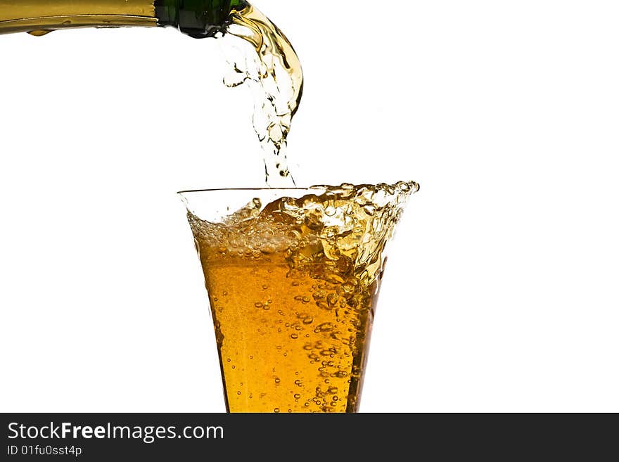 Pouring champagne isolated on white