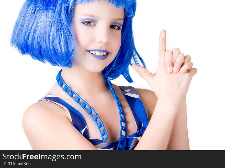 Young enthusiastic child with a blue wig shot on a white background. Young enthusiastic child with a blue wig shot on a white background