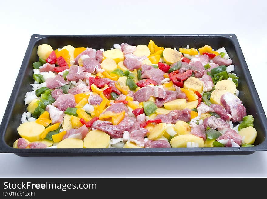 Crude meat and vegetables sliced