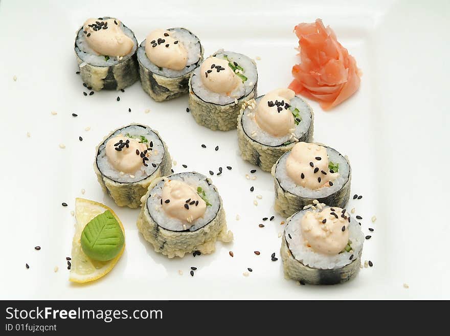 Traditional the Japanese meal sushi on a white background