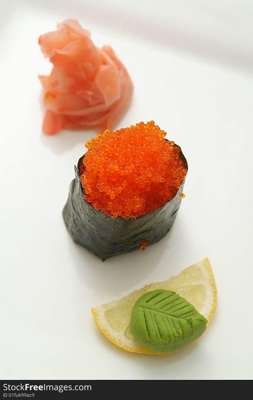 Traditional the Japanese meal sushi on a white background