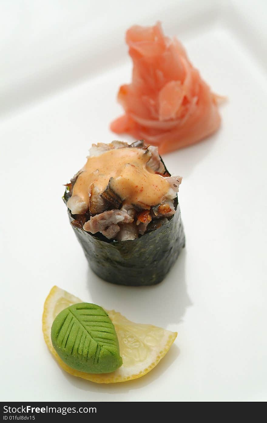 Traditional the Japanese meal sushi on a white background