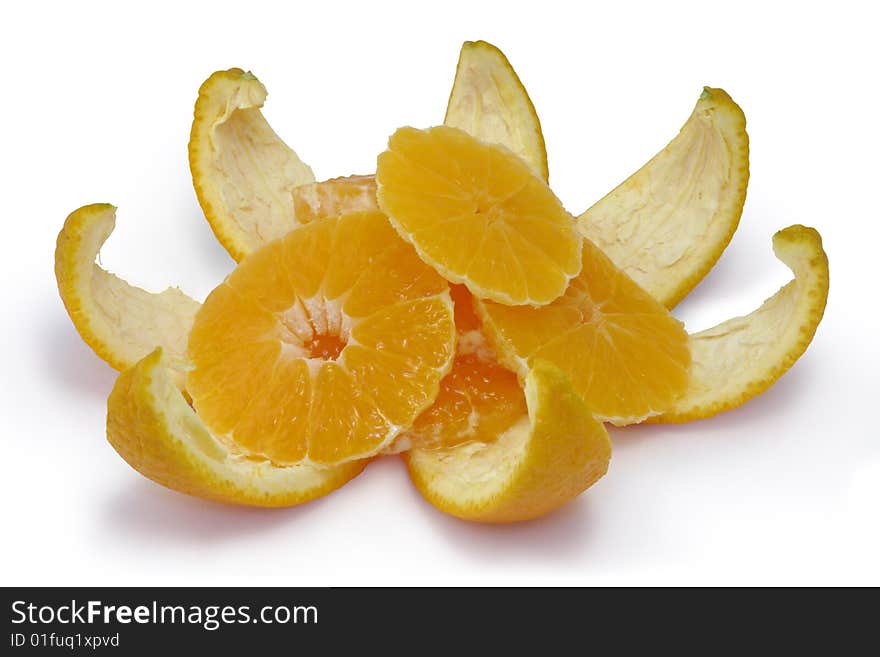 Slices Of An Orange On An Orange Peel.