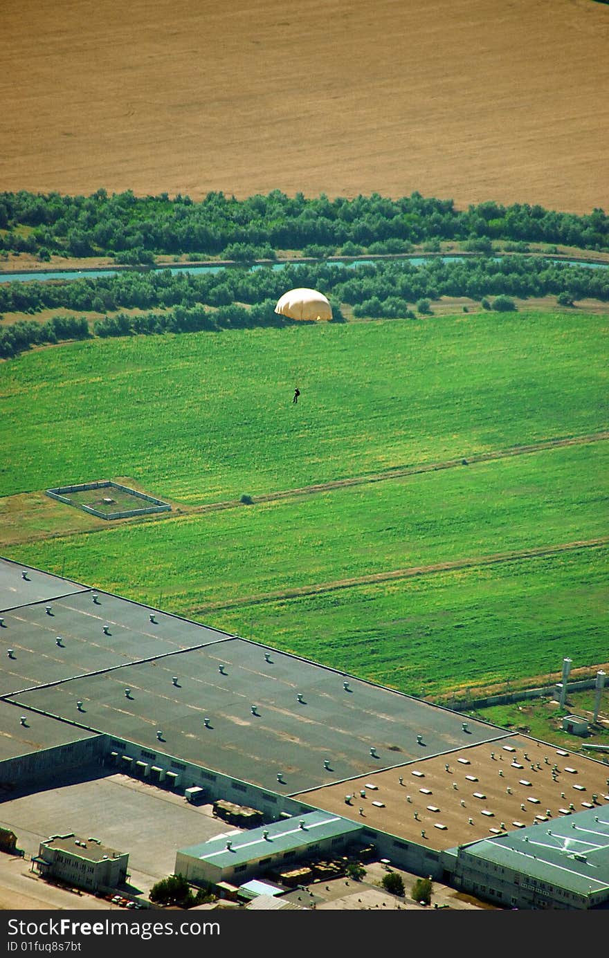 Paratrooper on background of the land; look overhand. Paratrooper on background of the land; look overhand