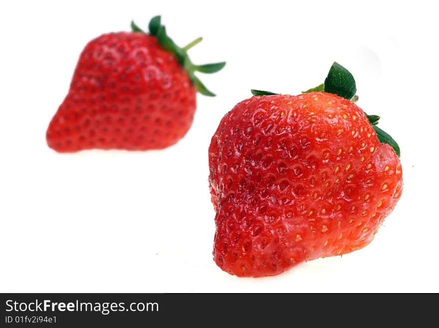 Fresh strawberries on white background.