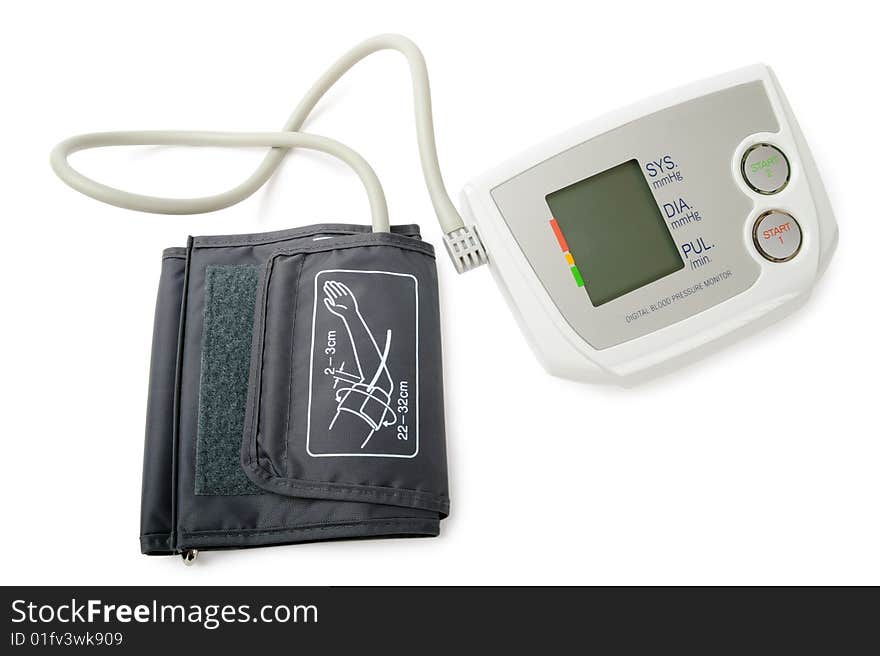 Digital blood pressure monitor isolated on white. Clipping path included.