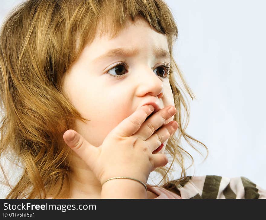 Portrait of a yawning adorable little girls. Portrait of a yawning adorable little girls