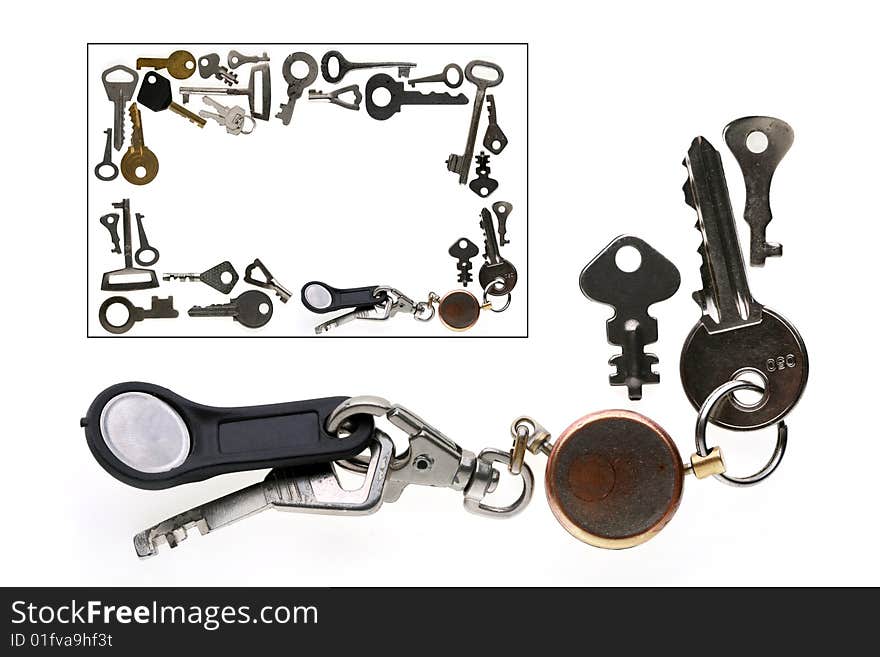 The frame is made of old and new various keys on a white background