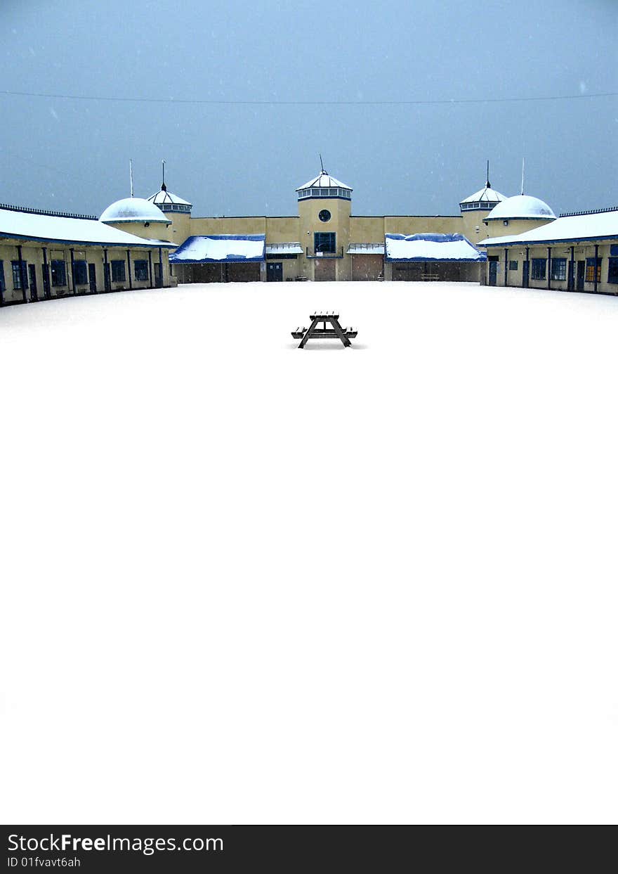 A picnic table left alone on Hastings pier on a winter day. A picnic table left alone on Hastings pier on a winter day