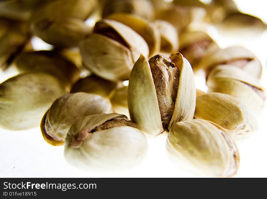 Group of Iranian pistachios in white background