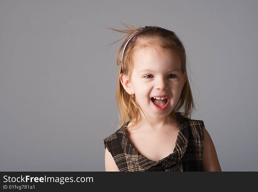 Amazing little beauty red-haired girl laugh and cry. Amazing little beauty red-haired girl laugh and cry.