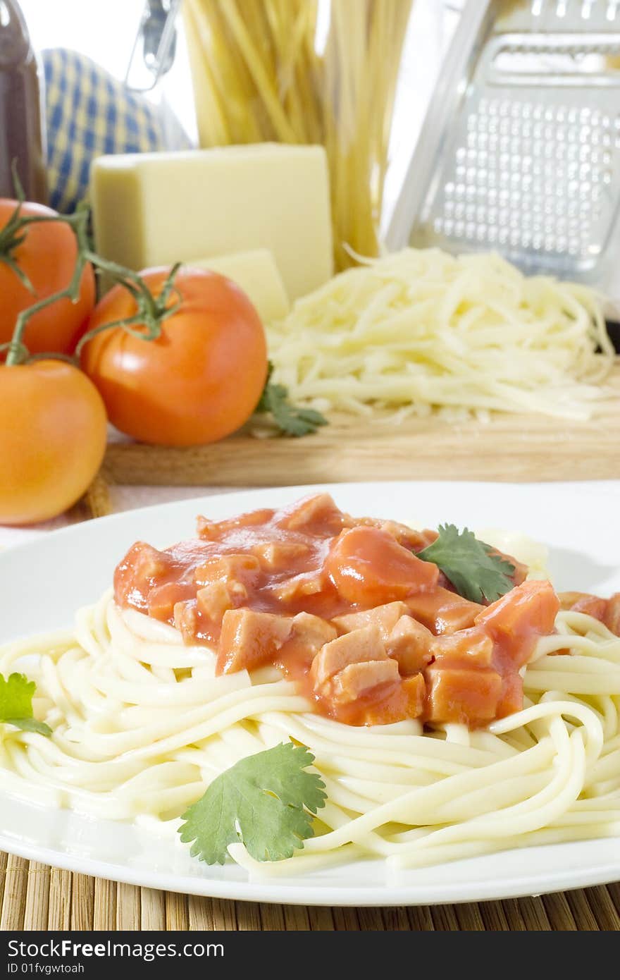 Close up shot of spaghetti on a white plate