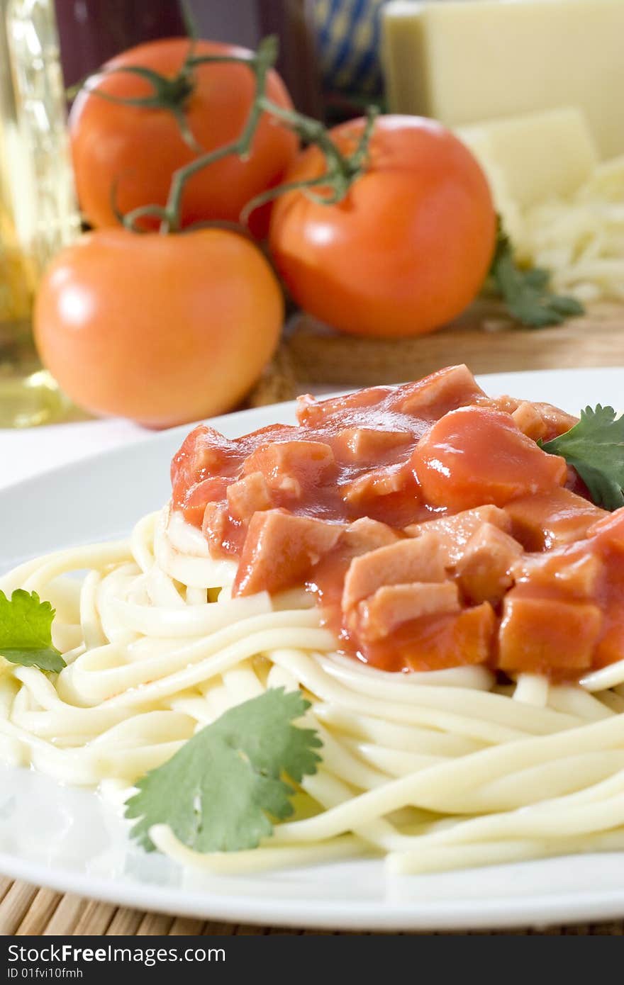 Close up shot of spaghetti on white plate with nice background. Close up shot of spaghetti on white plate with nice background