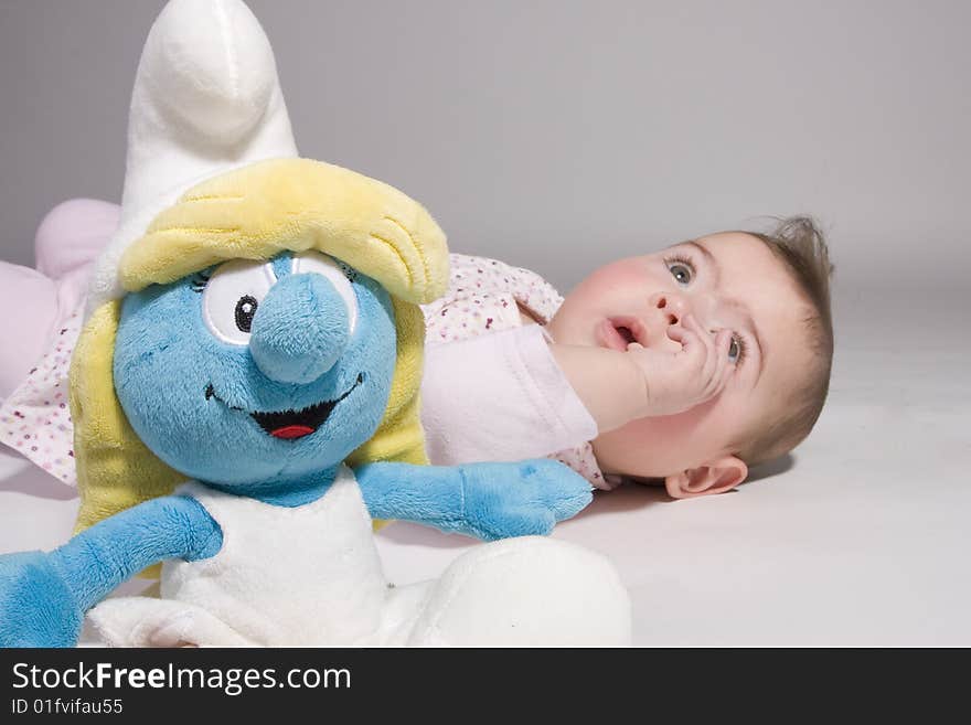 A baby with smurfin in front of it