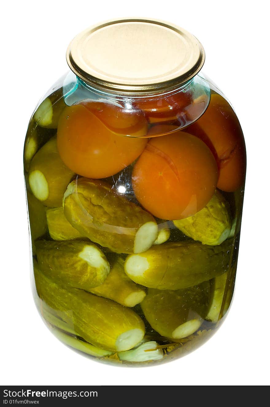 Big jar with cucumbers and tomatoes, isolated on white