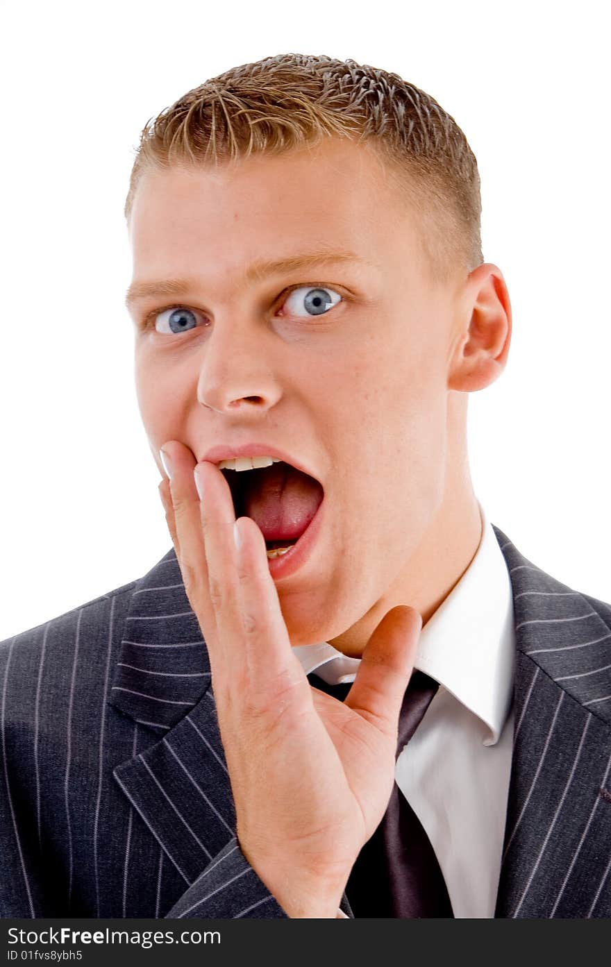 Close up view of amazed business man against white background