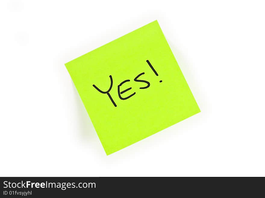 Post-it with the word YES! written on it isolated on white. Post-it with the word YES! written on it isolated on white