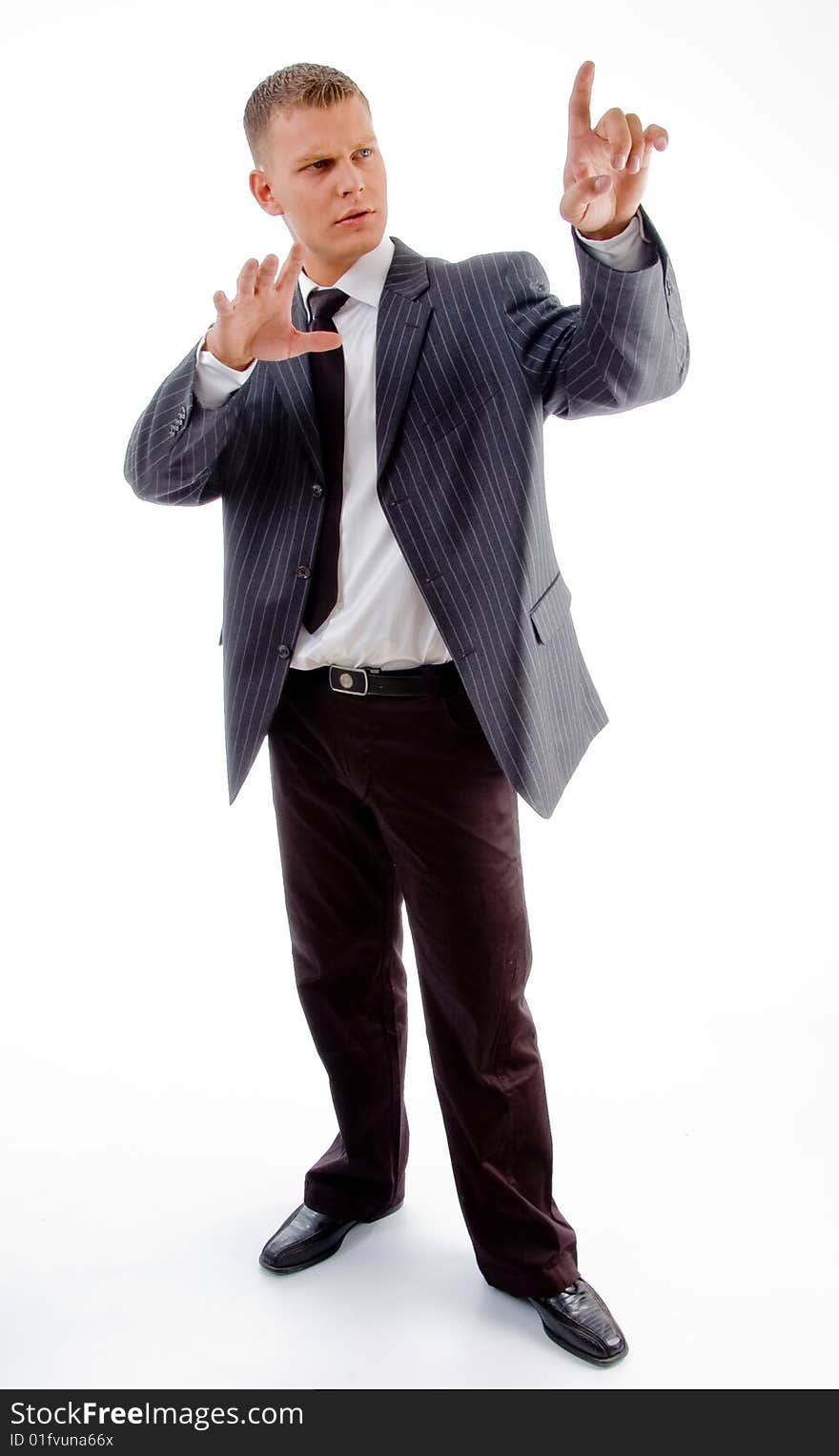 Businessman looking his index finger on an isolated white background