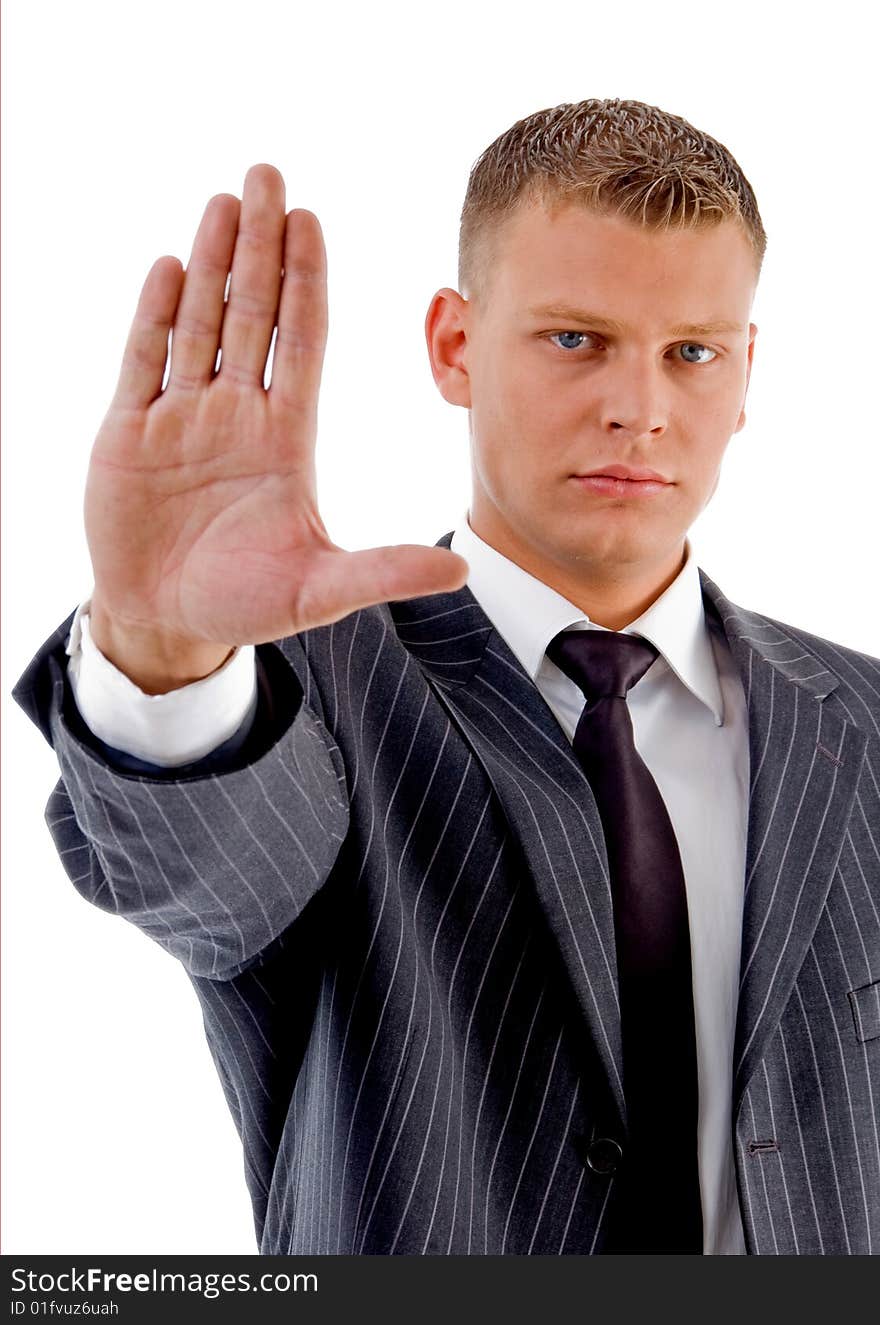 Young manager showing stopping gesture with white background. Young manager showing stopping gesture with white background