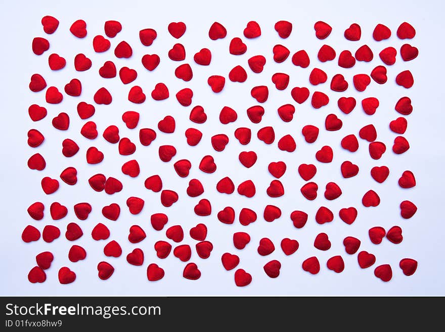 Small red hearts made from cloth. Small red hearts made from cloth.