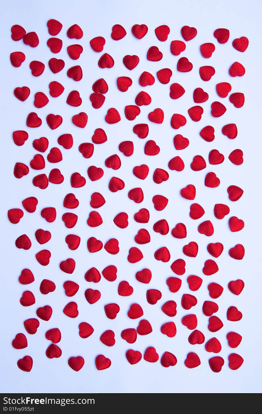 Small red hearts made from cloth. Small red hearts made from cloth.