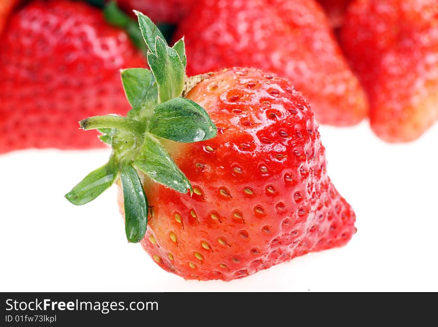 Very fresh strawberries on white background