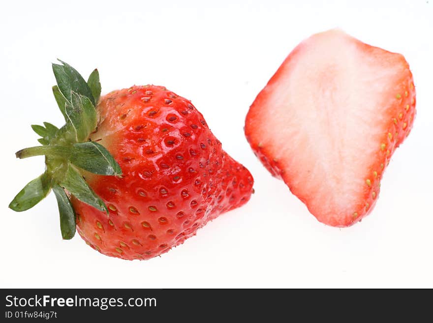 Fresh ripe strawberries on white background.