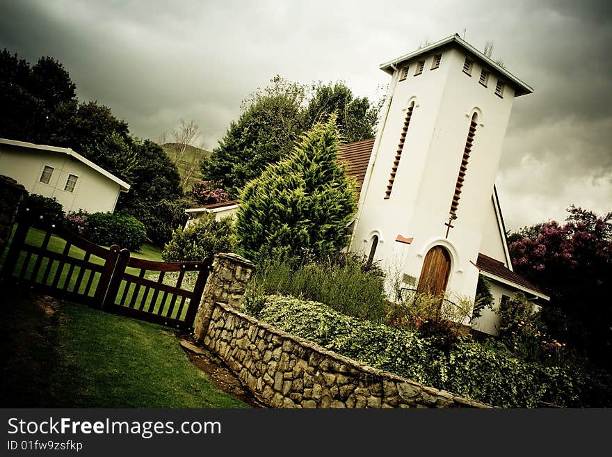 Church with a storm brewing in the sky