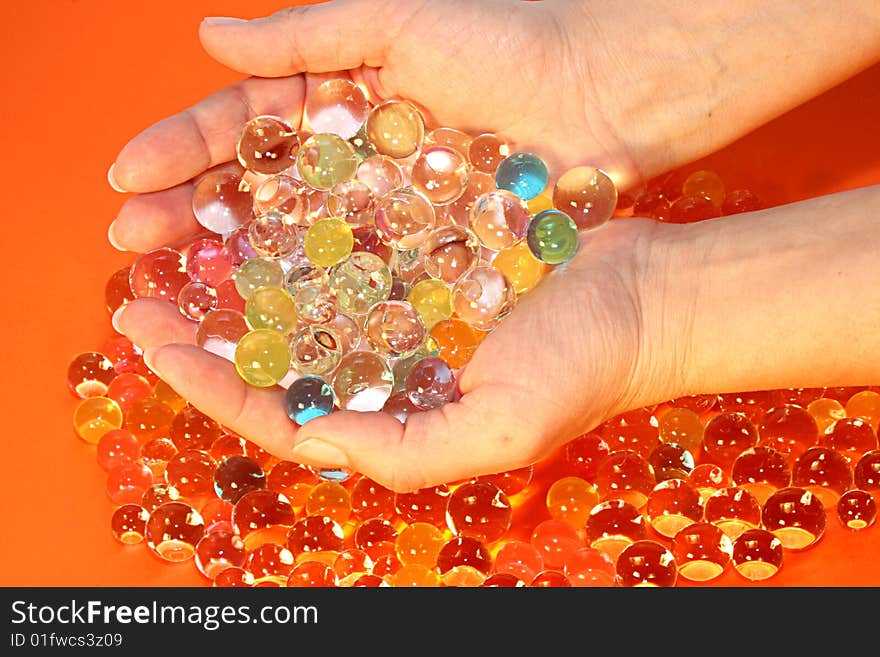 Girl hands holding water balls