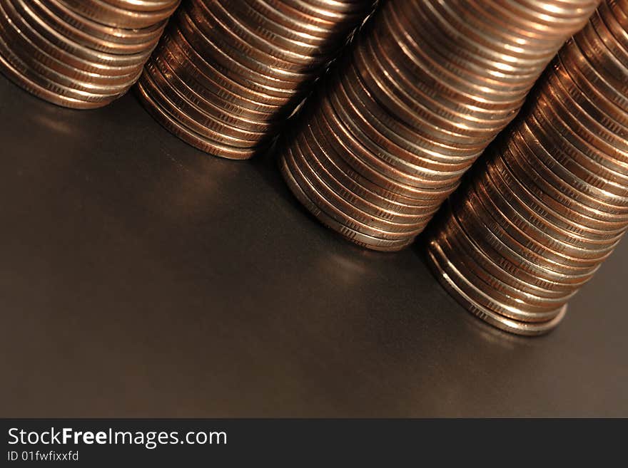 Background with close-up of four coin columns. Background with close-up of four coin columns