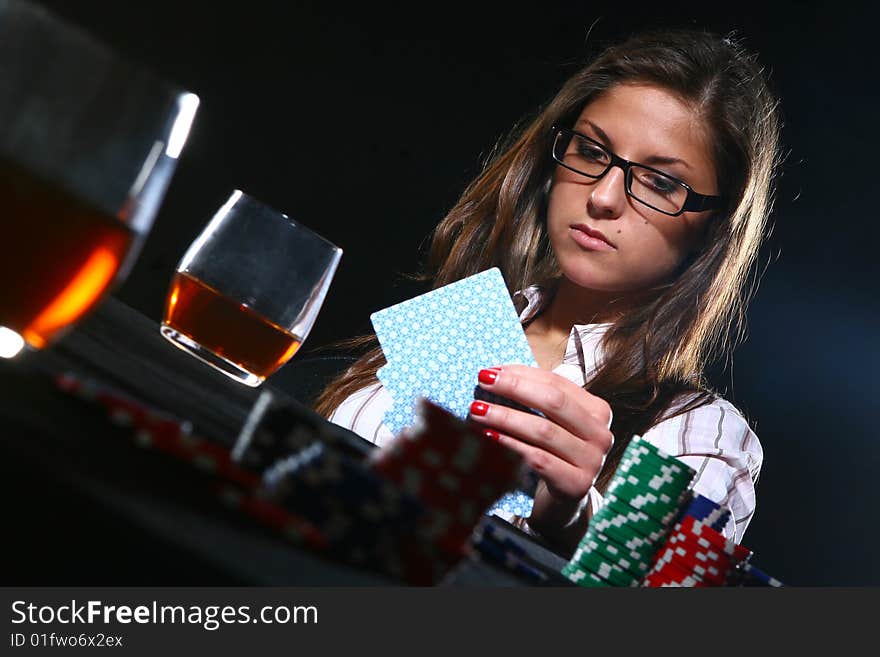 Beautiful woman who playing poker