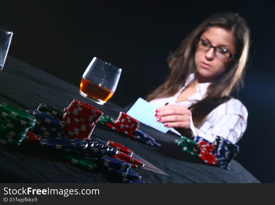 Beautiful woman who playing poker