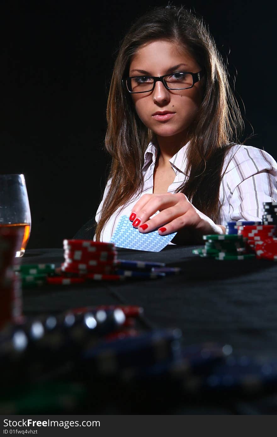 Beautiful woman who playing poker