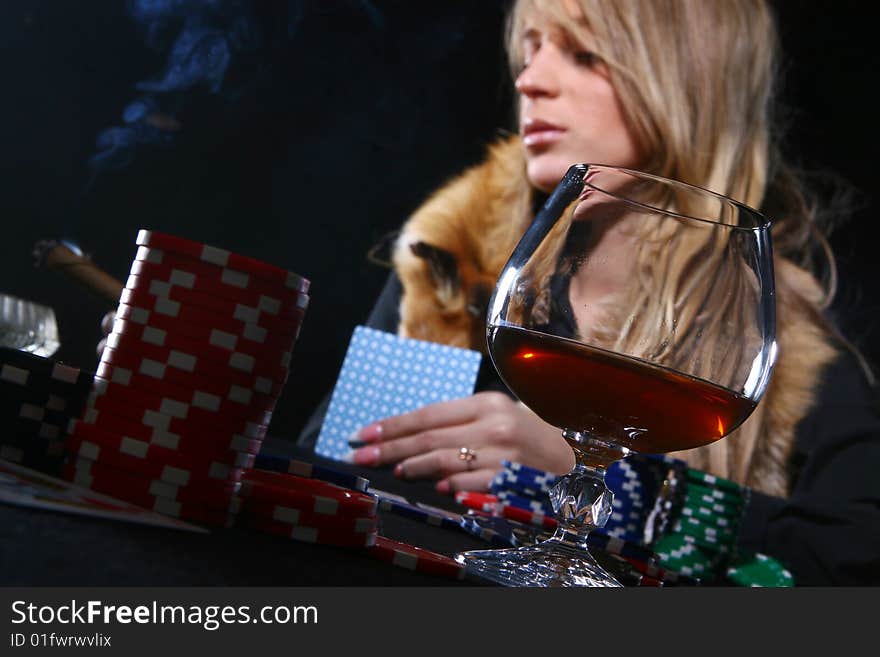 Beautiful woman who playing poker