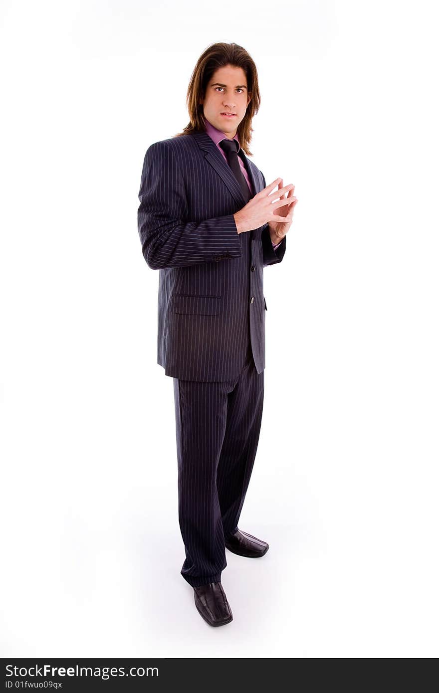 Side view of standing successful businessman with white background