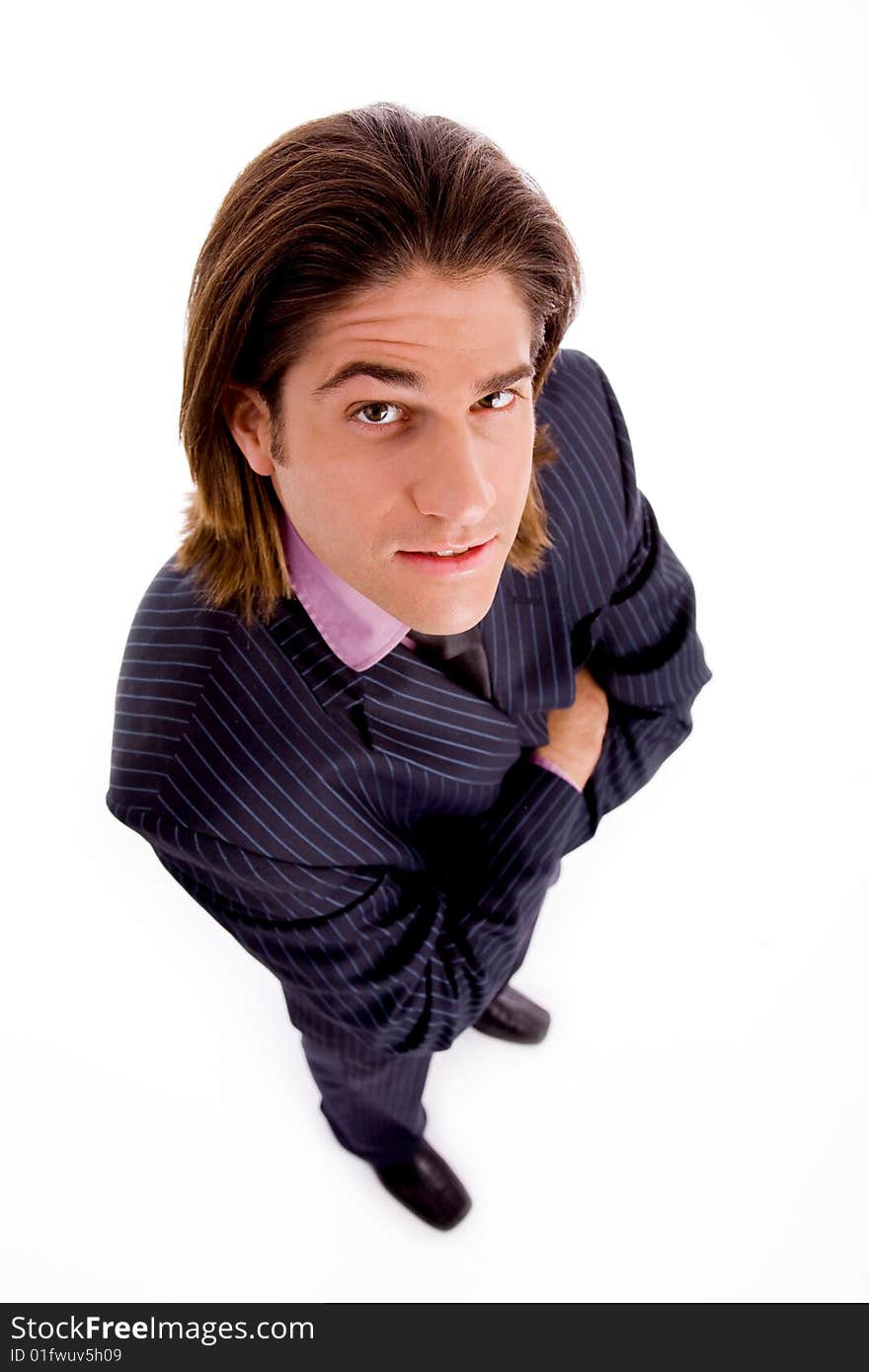 Side view of standing successful businessman with white background