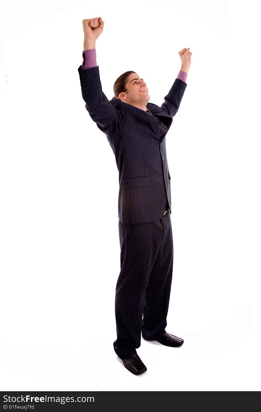 Side view of standing successful businessman with white background