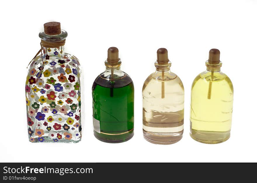 Multi-coloured bottles with oil  and sphere