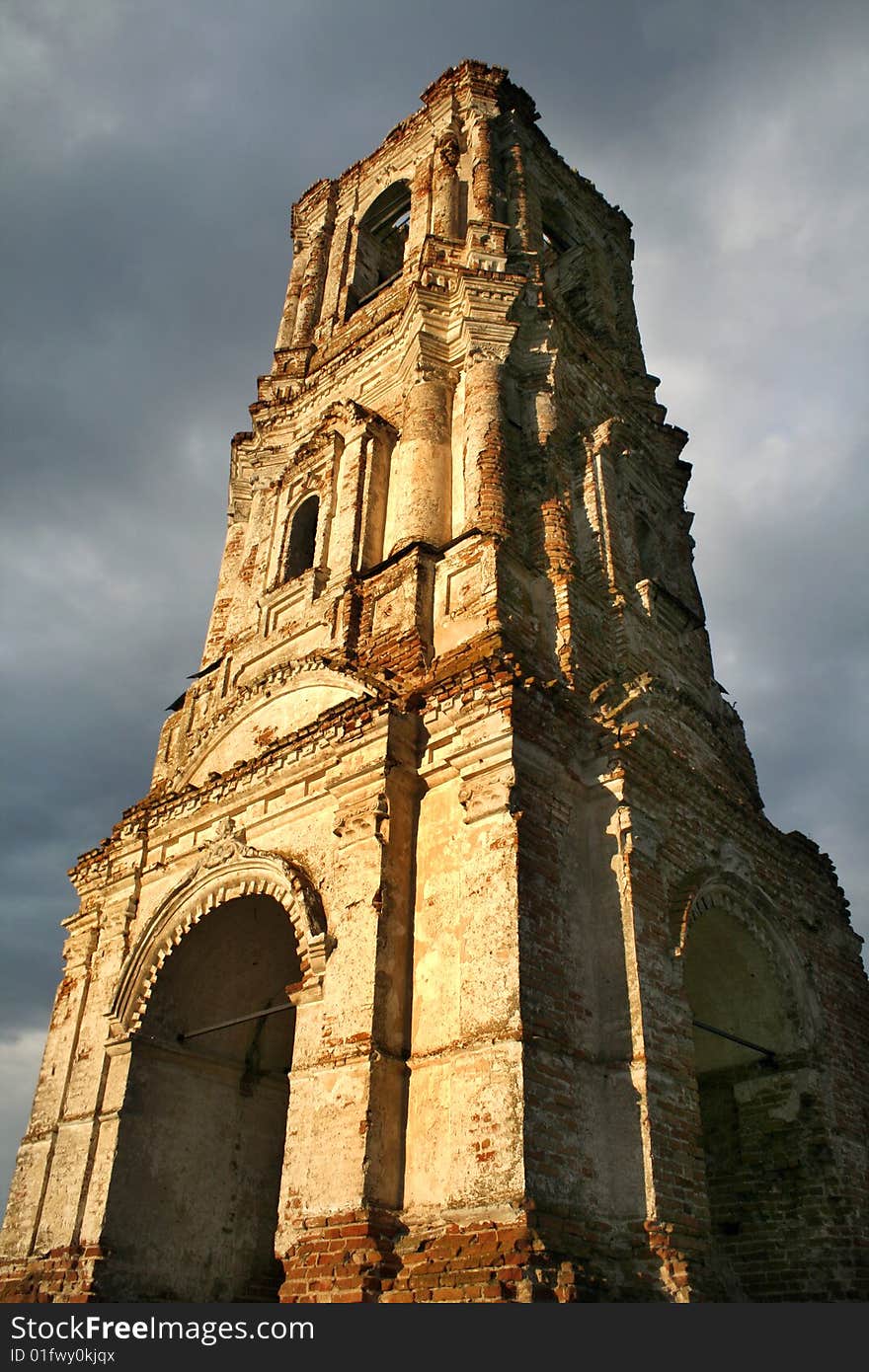 Russa. The Kachalino. The ruins of old belt-tower of the nineteenth centure in dark blue sky. Russa. The Kachalino. The ruins of old belt-tower of the nineteenth centure in dark blue sky.