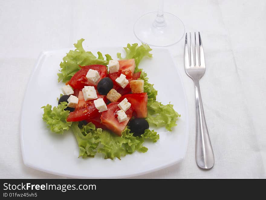 Dieting  salad with tomato, cheese, olive