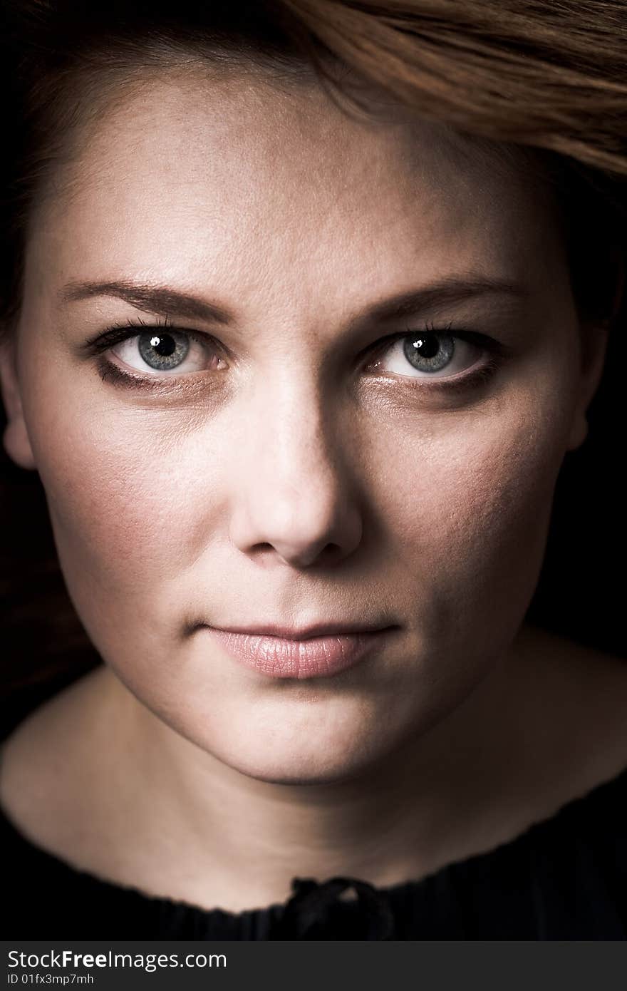 Portrait of adult woman. Studio. Portrait of adult woman. Studio.