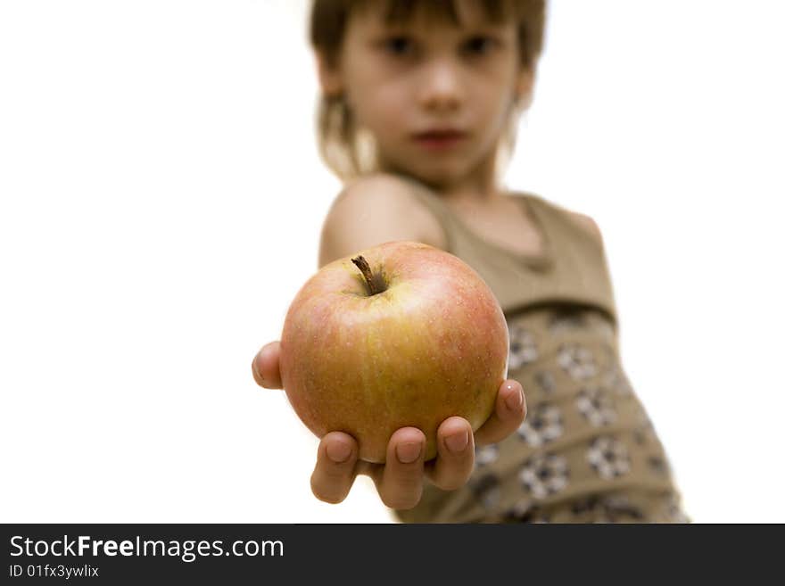 Young boy with red and yellow apple in hand. Young boy with red and yellow apple in hand