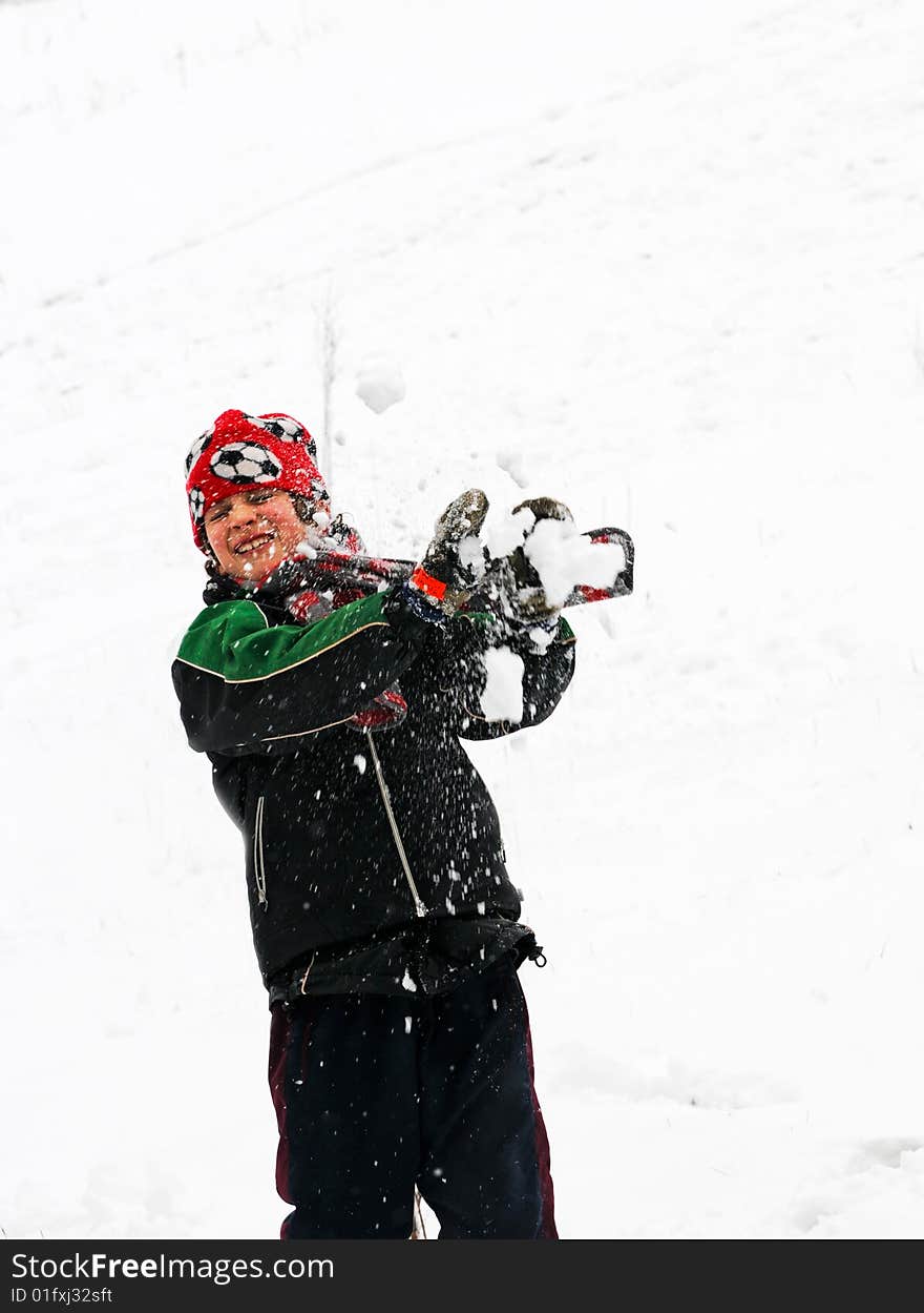 Boy Getting Snow In His Face