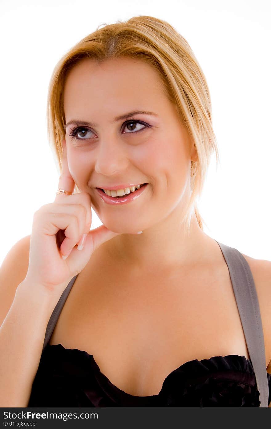 Smiling female holding her face on an isolated white background