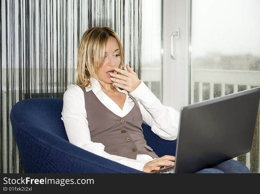 Beautiful businesswoman working at home