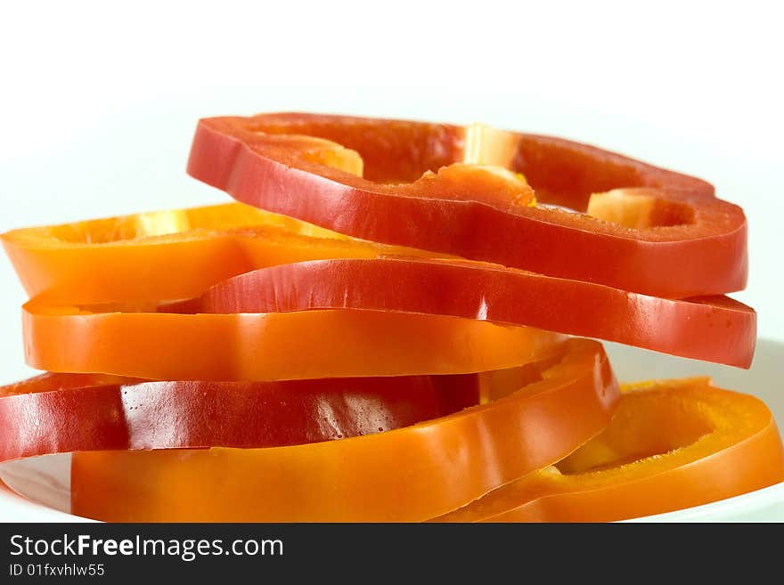 Capsicum pepper slices close up. Capsicum pepper slices close up