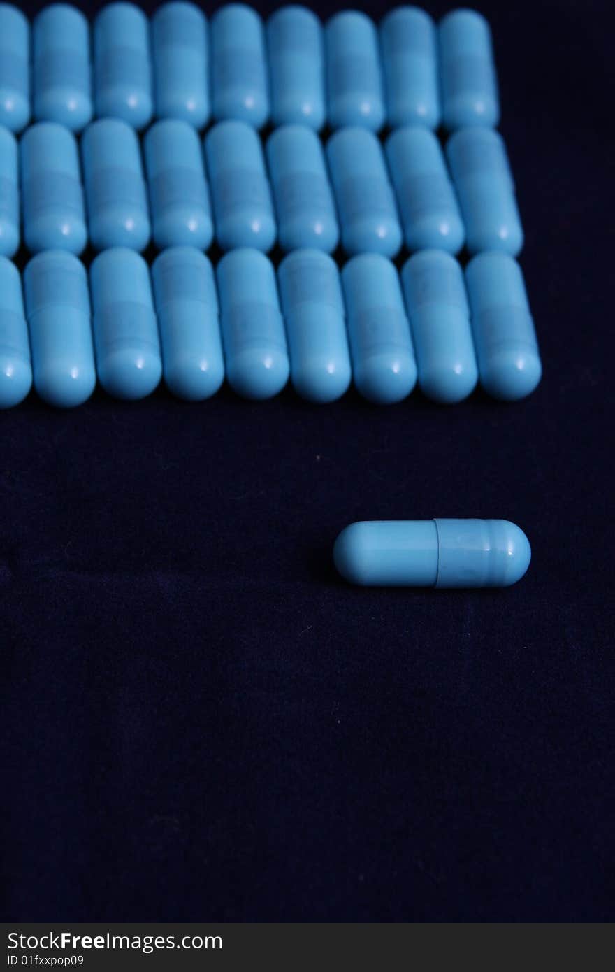 Medicine, a lt of blue tablets